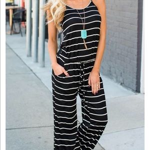 Black and white striped jumpsuit size small